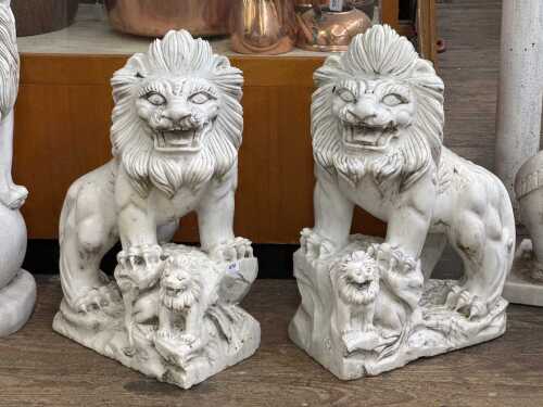 Pair of carved marble lion statues