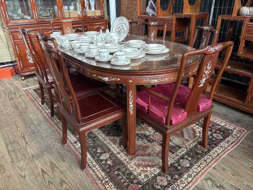 A Chinese hongmu and mother of pearl inlaid nine piece dining suite