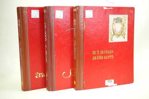 Three albums of stamps