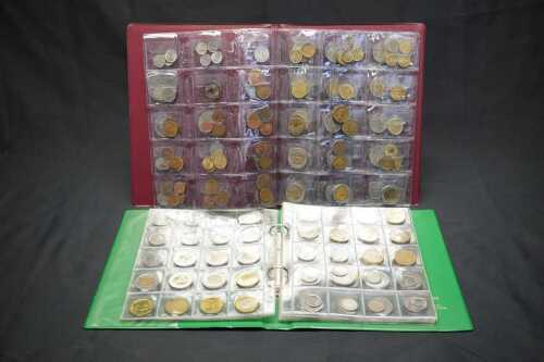 Two albums of world coins