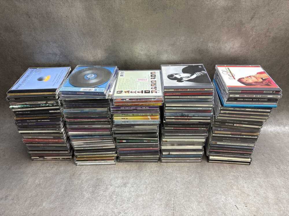 Group of CDs and Cd singles